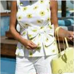 Kate Spade Daisy Dot peplum size 8 sleeveless white with yellow daisies.